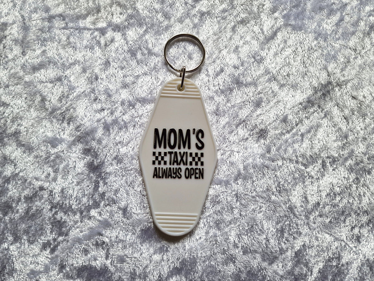 Mom’s Taxi Always Open Motel Keychain